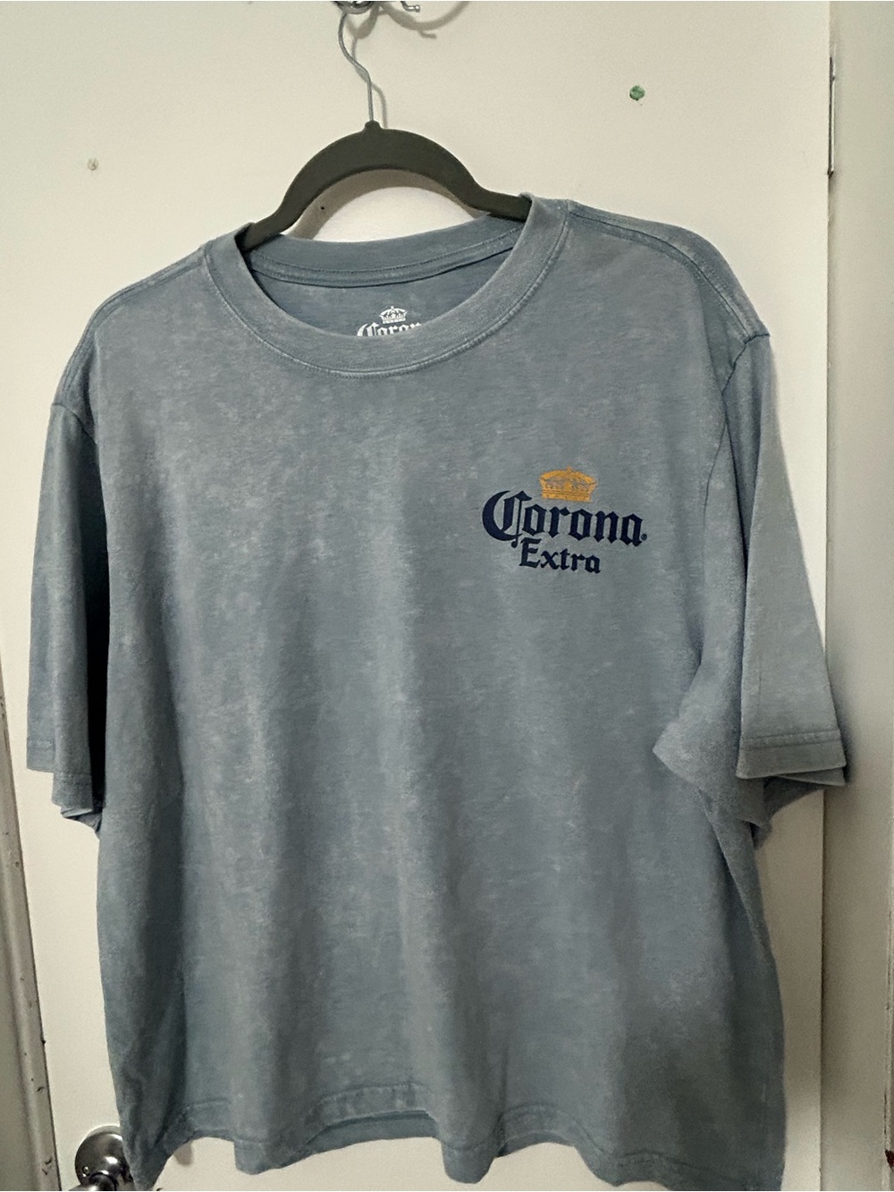 Corona Men's Faded Blue Logo Tee with Gold Accent